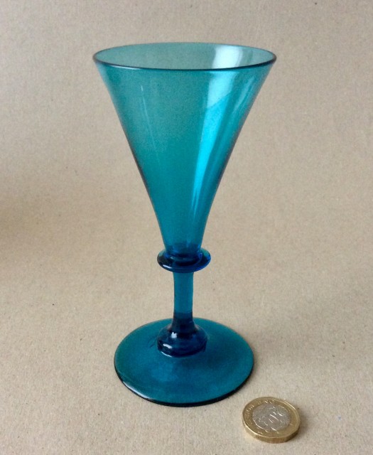 Antique early 19th century plain stem blue wine glass with trumpet bowl.