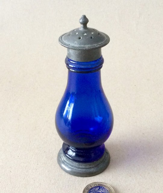 Antique pewter mounted blue glass pepper pot.
