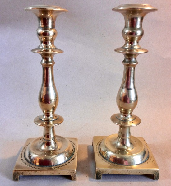 Pair of heavy 19th century solid  brass candlesticks.
