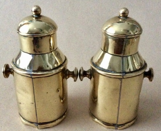 Pair of antique brass churn shaped tea caddies or cream carriers.