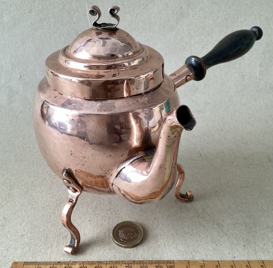 Antique Swedish copper chocolate pot, turned wood side handle on thee legs 