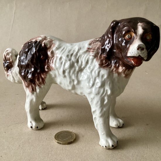 Antique Staffordshire pottery Standing St Bernard dog Figure.