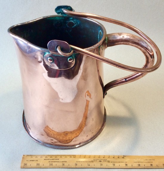 Antique 19th century copper ale jug with copper bail  carrying handle.