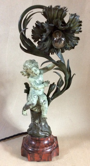 Spelter and copper Art Nouveau cherub electric table lamp on good marble socle base.