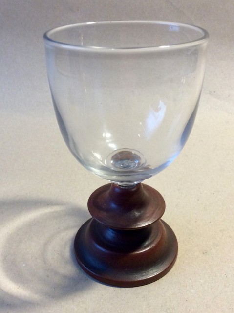 Antique glass goblet with painted treen replacement foot.