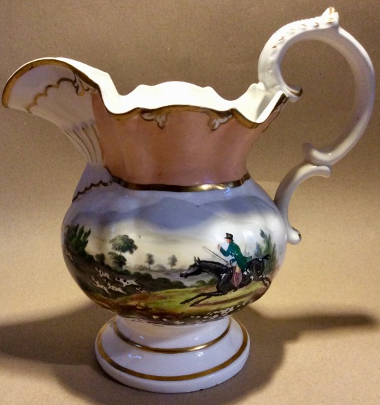 Antique Victorian large jug with hand painted flowers and hunt scene.