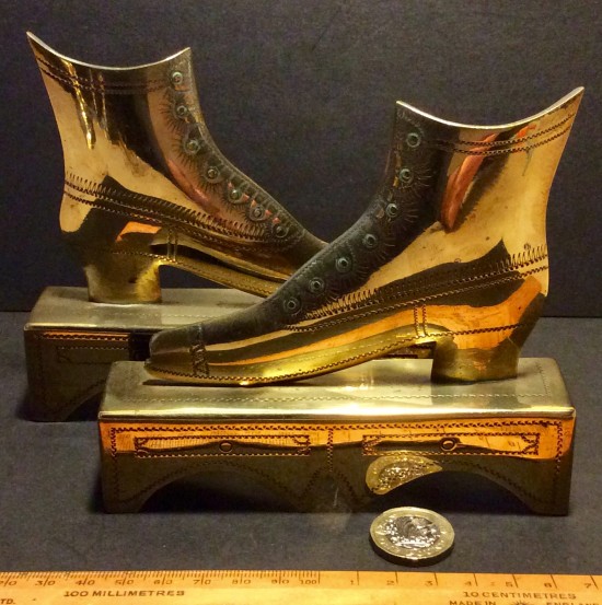 Antique Victorian pair engraved sheet boot/shoe mantelpiece ornaments 