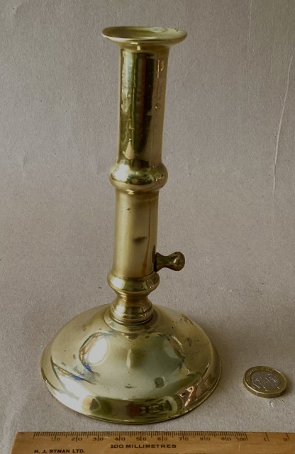 Antique brass round base slider candlestick circa 1740