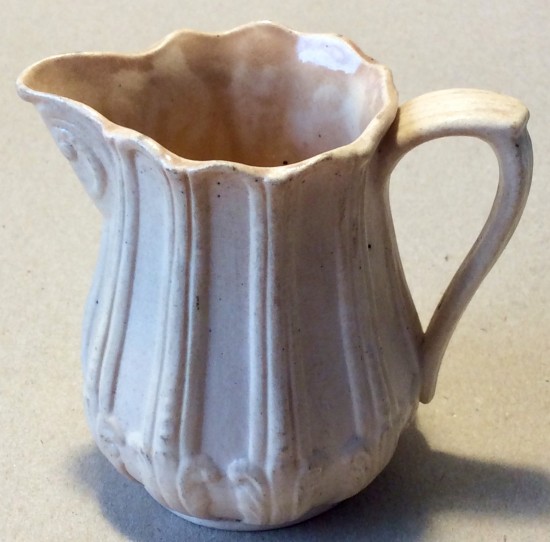 Antique drabware cream jug