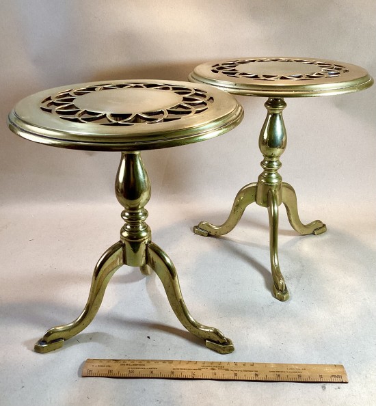 Victorian heavy brass tripod table high trivets with round pierced tops.