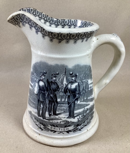 Antique large pottery commemorative transfer jug. “THE BRITISH VOLUNTEERS”