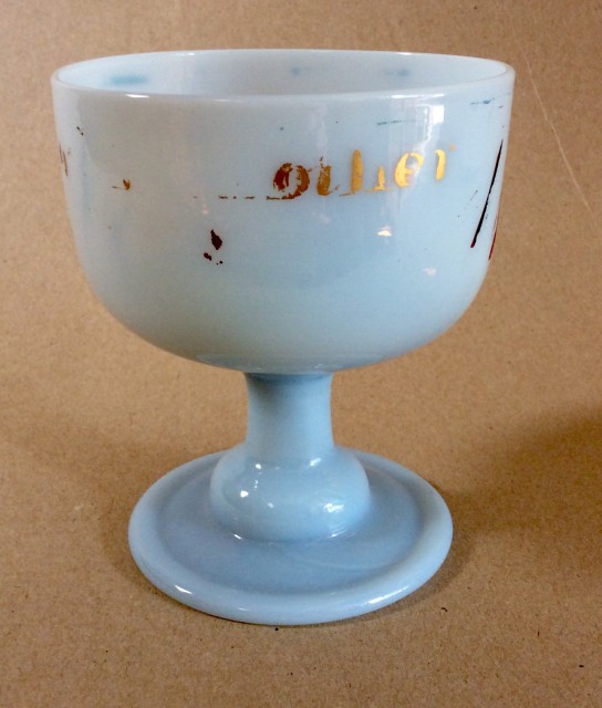 Milk glass sugar bowl on folded foot