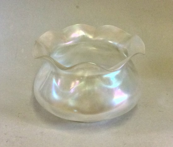 Irridescent glass bowl with waved edge