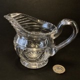 Early 19thC Regency style cut glass cream jug.