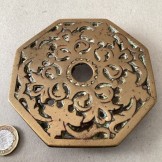 Octagonal cast brass kettle trivet. C1893