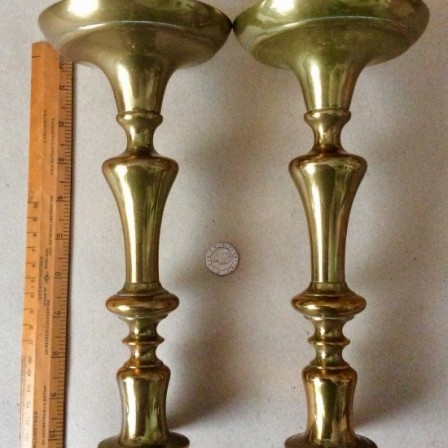 Detail: Antique Georgian round base brass candlesticks 