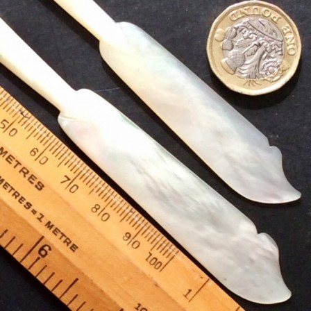 Detail: Antique Victorian Mother of Pearl butter knives.