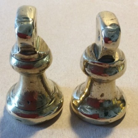 Detail: Two Vintage 8Oz brass bell weights