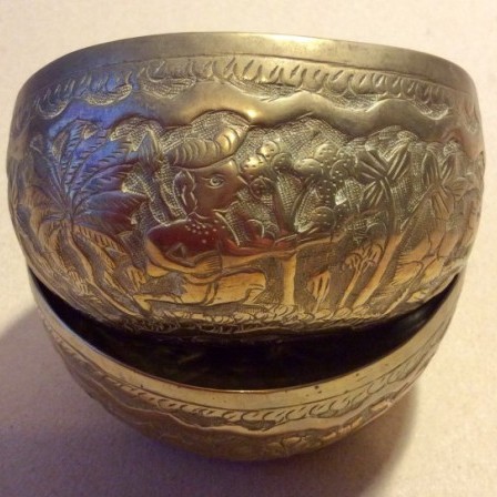 Detail: Pair of early C20 Indian engraved and chased brass begging bowls
