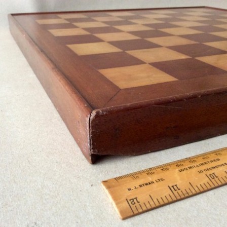 Detail: Antique early 20th century Marquetry chess board. Satinwood, walnut and mahogany.