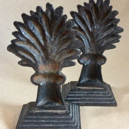 Detail: Victorian black painted Cast Iron wheatsheaf door stops or hearth ornaments