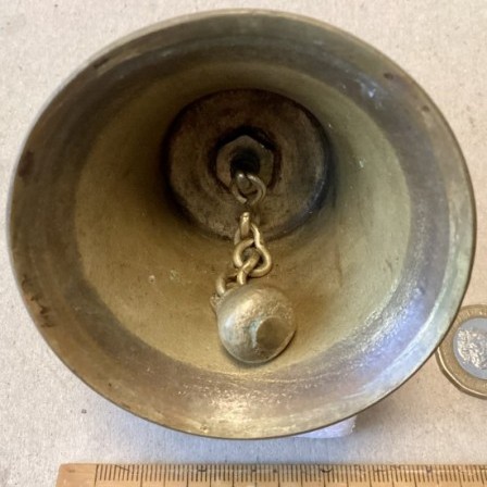 Detail: Antique brass table bell