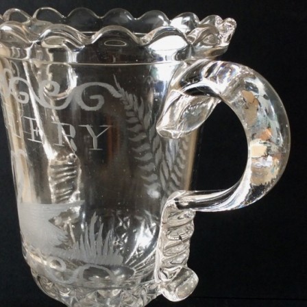 Detail: Antique clear pressed and engraved  glass Celery vase  with applied strap handles (trophy shape)