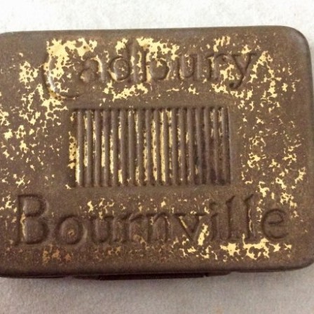 Detail: Antique Cadbury’s Bournville Cocoa advertising Vesta or match tin. C1920