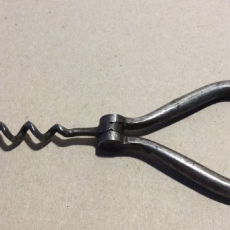 Detail: Victorian steel folding bow pocket corkscrew.