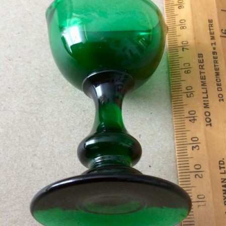 Detail: Antique hand blown green glass Eye Beth