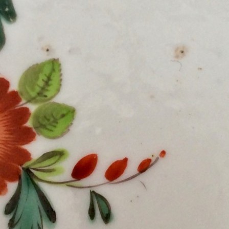 Detail: Antique porcelain press moulded German flower plate.