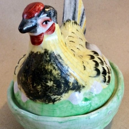 Detail: Late Staffordshire pottery Hen on nest egg crock.