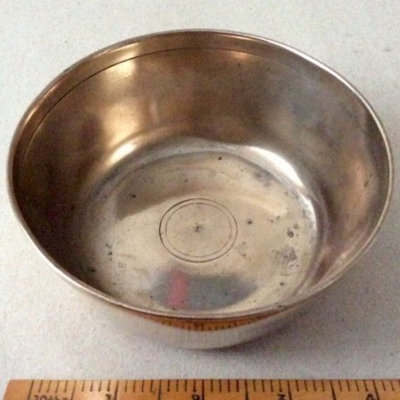 Detail: Antique small brass slope sided food bowl (eating or food preparing)
