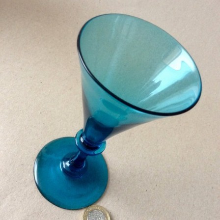 Detail: Antique early 19th century plain stem blue wine glass with trumpet bowl.