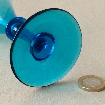 Detail: Antique early 19th century plain stem blue wine glass with trumpet bowl.