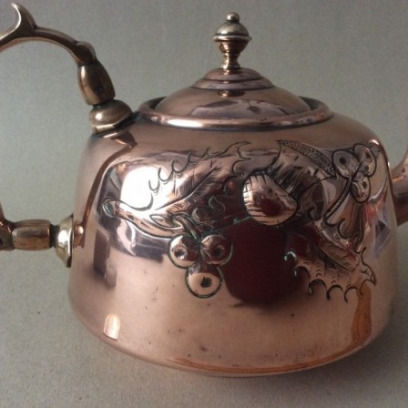 Detail: Antique repousse engraved copper teapot. C1900. Made by W Soutter & sons. (W. S&S Ltd.) Birmingham.