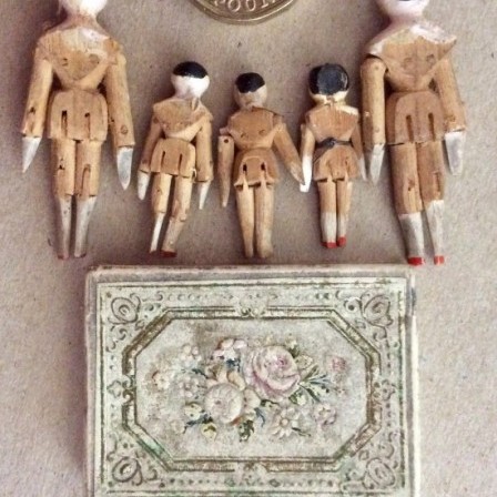 Detail: Victorian Grodnertal family miniature wooden peg dolls.