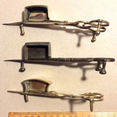 Detail: Antique metalware candle stuffers /wick trimmers.