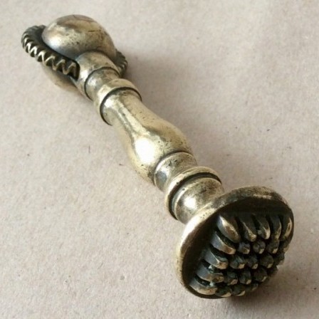 Detail: Antique Victorian brass pastry cutter,crimper.