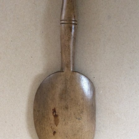 Detail: Short handle wooden spoon or butter scoop