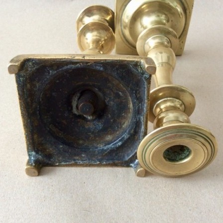 Detail: Pair of heavy 19th century solid  brass candlesticks.