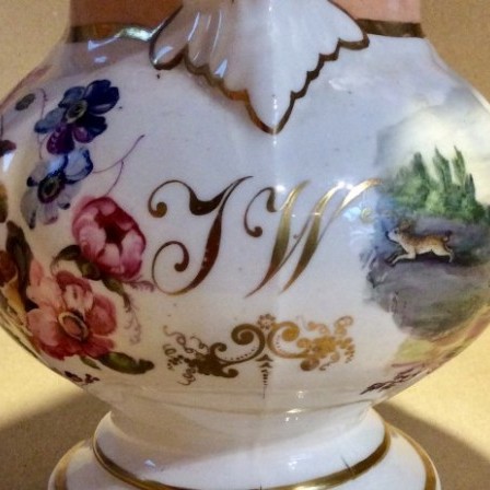 Detail: Antique Victorian large jug with hand painted flowers and hunt scene.