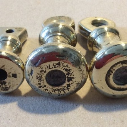 Detail: Two 4Oz and one 2Oz brass crown bell weights.