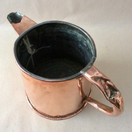 Detail: Large Antique copper ale jug