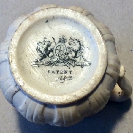 Detail: Antique drabware cream jug