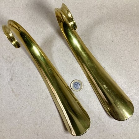 Detail: Pair Antique Victorian curled brass shoehorns. 