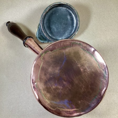 Detail: Antique Victorian copper milk saucepan and lid