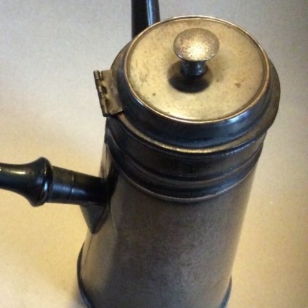 Detail: 19C toleware coffee pot with hinged lid and wooden side handle