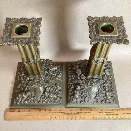 Detail: Pair of antique 17th century style brass candlesticks circa 1920