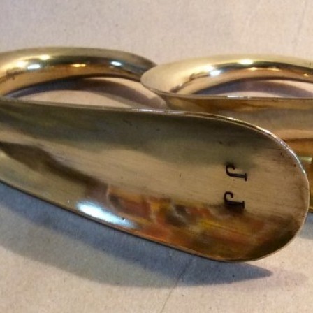 Detail: Pair Victorian brass shoe horns